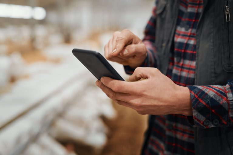 Person reviewing agriculture planning on a tablet